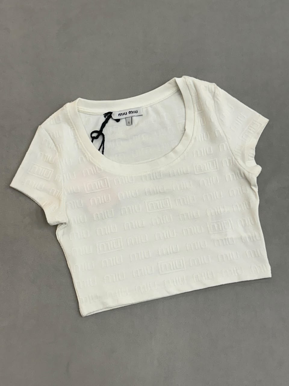 CROP TOP MIU MIU TURCO*