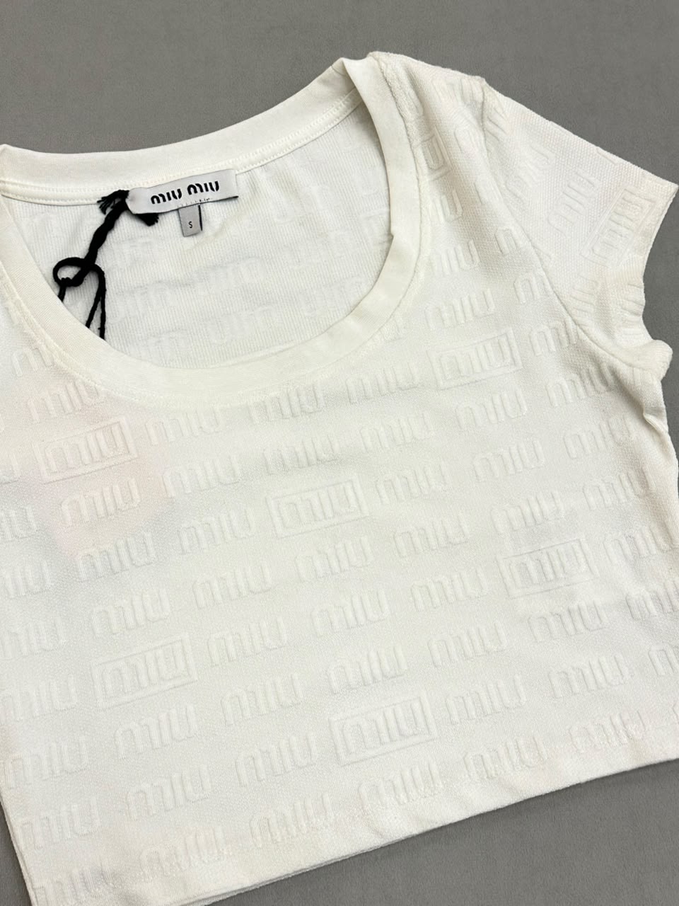 CROP TOP MIU MIU TURCO*