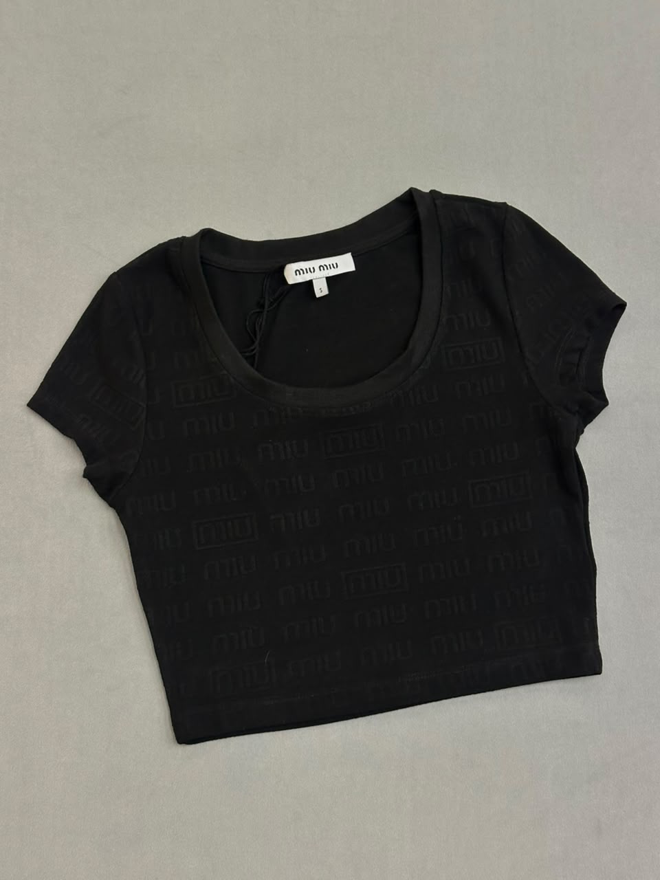 CROP TOP MIU MIU TURCO*
